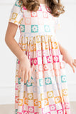 Checkmate Pocket Swirl Dress